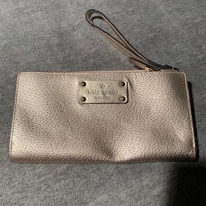 Kate spade rose gold wristlet wallet